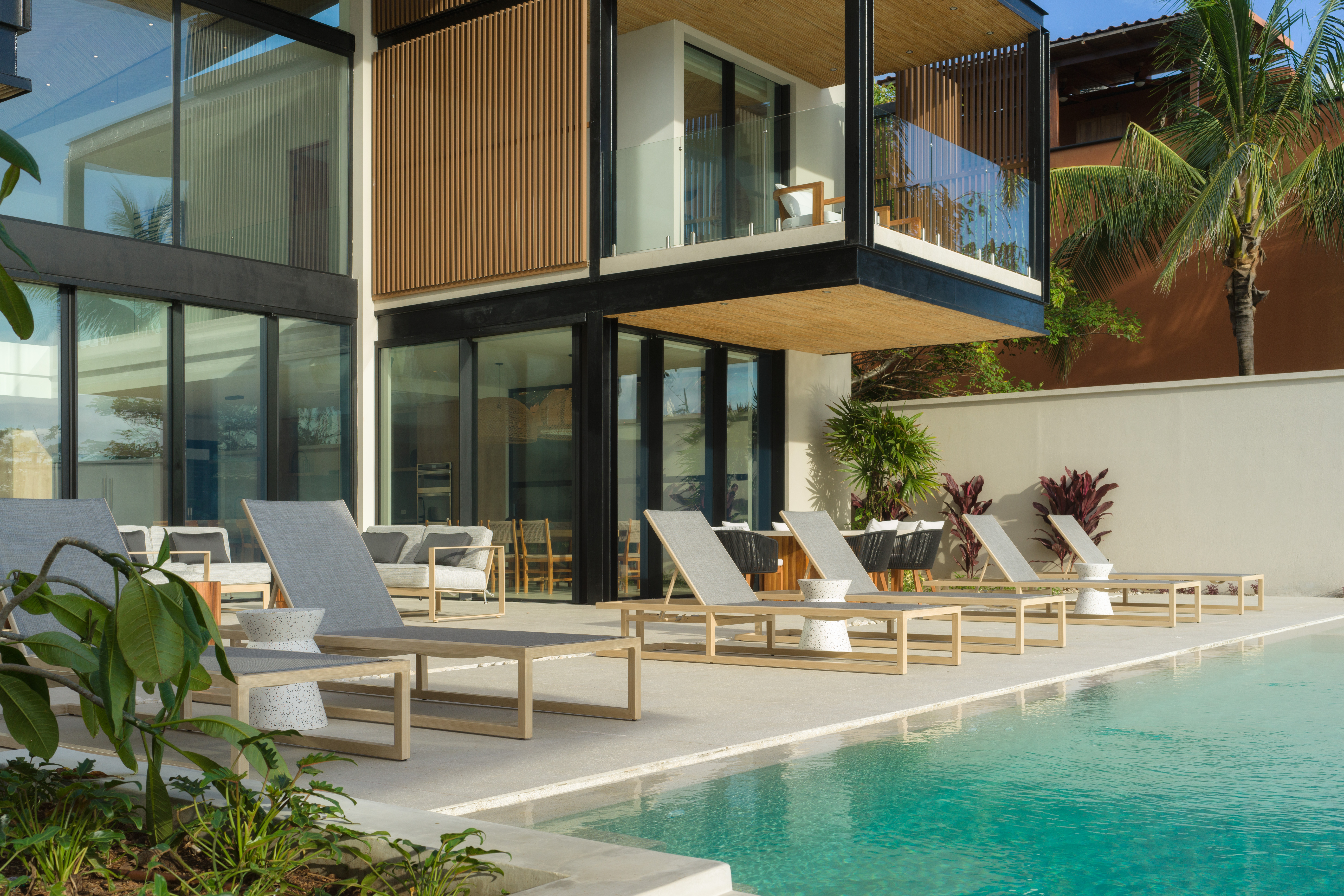 Comfortable chairs, perfectly positioned around the pool for you