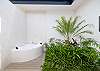 Jaccuzi in master outdoor bathroom