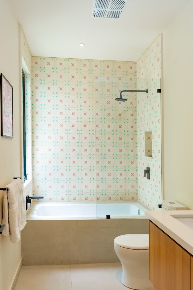 The bathroom with shower and tub