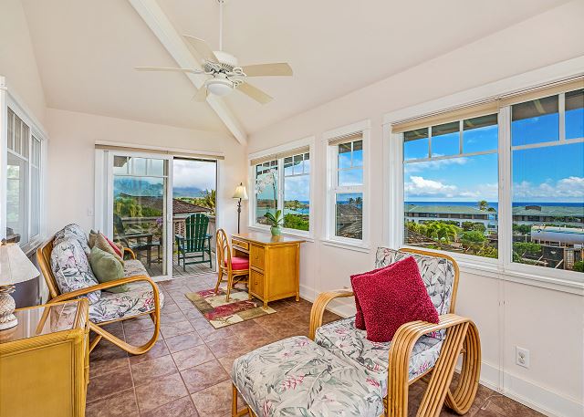Upper level sun room with ocean views.