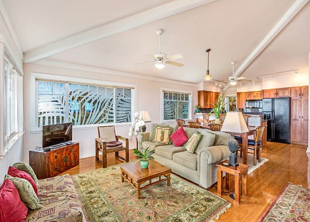 Spacious living, dining and kitchen area upstairs.