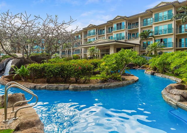 Inviting oceanfront pool with hot tub and slide