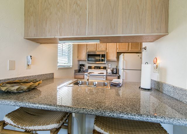 Full Kitchen with Granite Counter Tops
