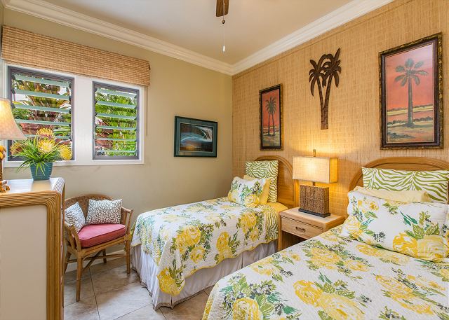 This inviting 2nd bedroom has 2 twin beds.