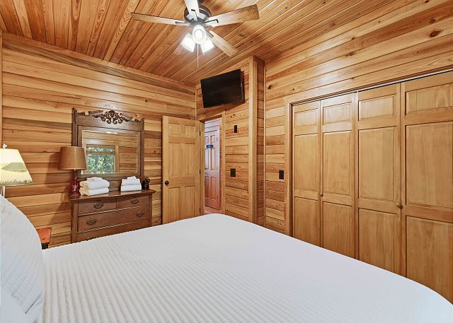 Mounted Television in First Guest Bedroom