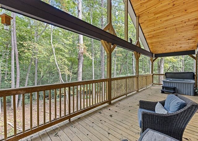 Large private back deck overlooking trail