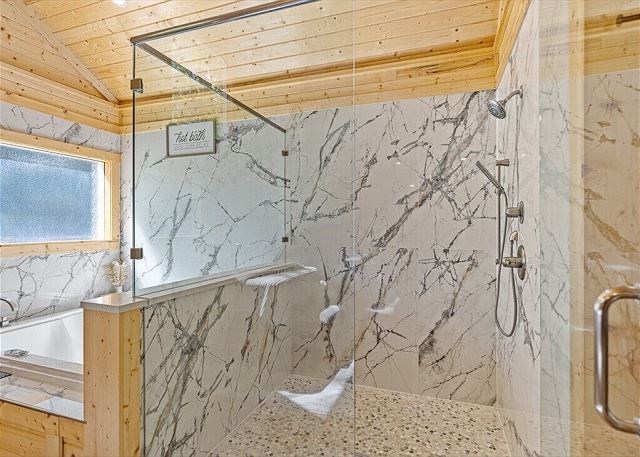 After the tub, rinse off in the shower made for two