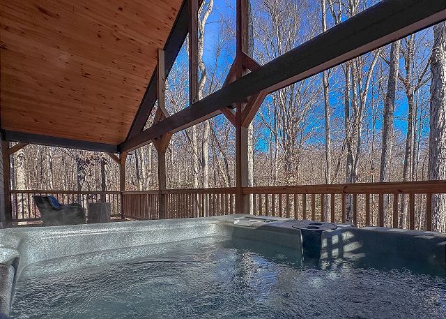 Private surroundings during your soak in the steamy hot tub