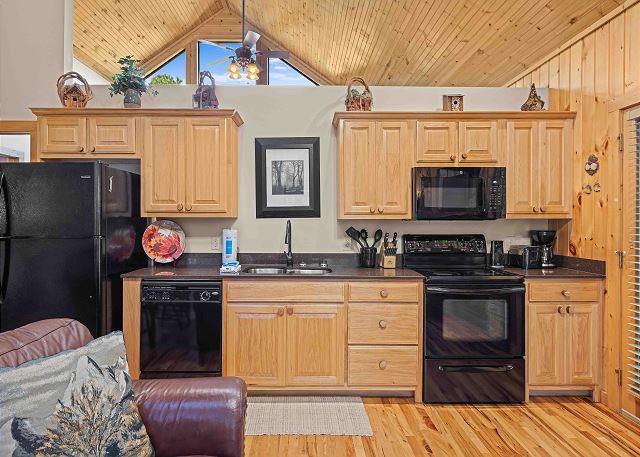 Full-Size Refrigerator, Dishwasher, Microwave, Stove Top and Ove