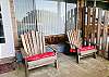 Wooden Adirondack Chairs on Patio