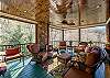 Screened porch w/seating & wood stove