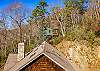 Treehouse above the house
