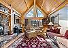 Luxury living room w/floor to ceiling windows