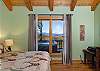 Master bedroom w/king bed, views, and wireless printer