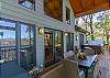 Back deck with outdoor dining table & hot tub