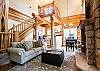Living room with gas log fireplace and flat screen TV.