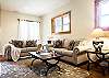 Downstairs living area with queen sleeper sofa.