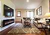 Downstairs living area with queen sleeper sofa.