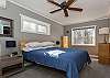 Upstairs master suite w/ queen bed and full bath.