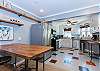 Dining area opens up into kitchen.