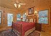 Upstairs queen bedroom with full bath. Door out to back deck.