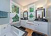 Master bathroom with double sinks.