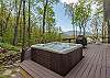 Soak in the hot tub will enjoying amazing views