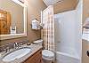 Full hall bathroom on main level.