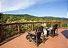Deck access & patio seating from the primary suite.