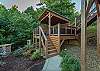Steps leading to the covered hot tub area
