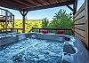 Relax in the hot tub and enjoy the mountain views.