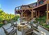 Gather around the outdoor fire pit area