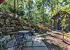 Lower patio with table (seating for 3) and fire pit.