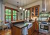 Kitchen amenities include dishwasher and coffee maker.