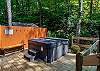 Hot tub surrounded by lush trees