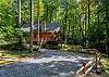 Driveway and parking area alongside the cabin