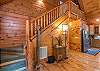Stairs to upper level king bedroom.