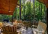 Gorgeous views of the surrounding woods from the porch