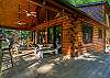 Outdoor dining table on the covered porch