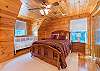 Queen bedroom w/ crib on upper level.