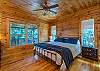 Master bedroom w/ king bed & en suite bathroom.