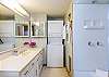 Walk-in shower and laundry in main level full bath.