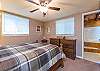 Main floor bedroom with queen and full bath.