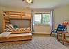 One of 2 bunk rooms on upper level w/ twin trundle.