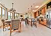 Great room w/ dining area (seating for 10), kitchen, & living ar