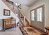 Entry way to main level w/ stairs leading to upper level.