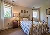 Queen bedroom on upper level.