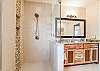 En suite walk-in shower on main level