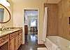 Lower level bathroom w/ shower/tub combo.