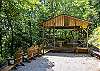 Picnic area by community waterfall